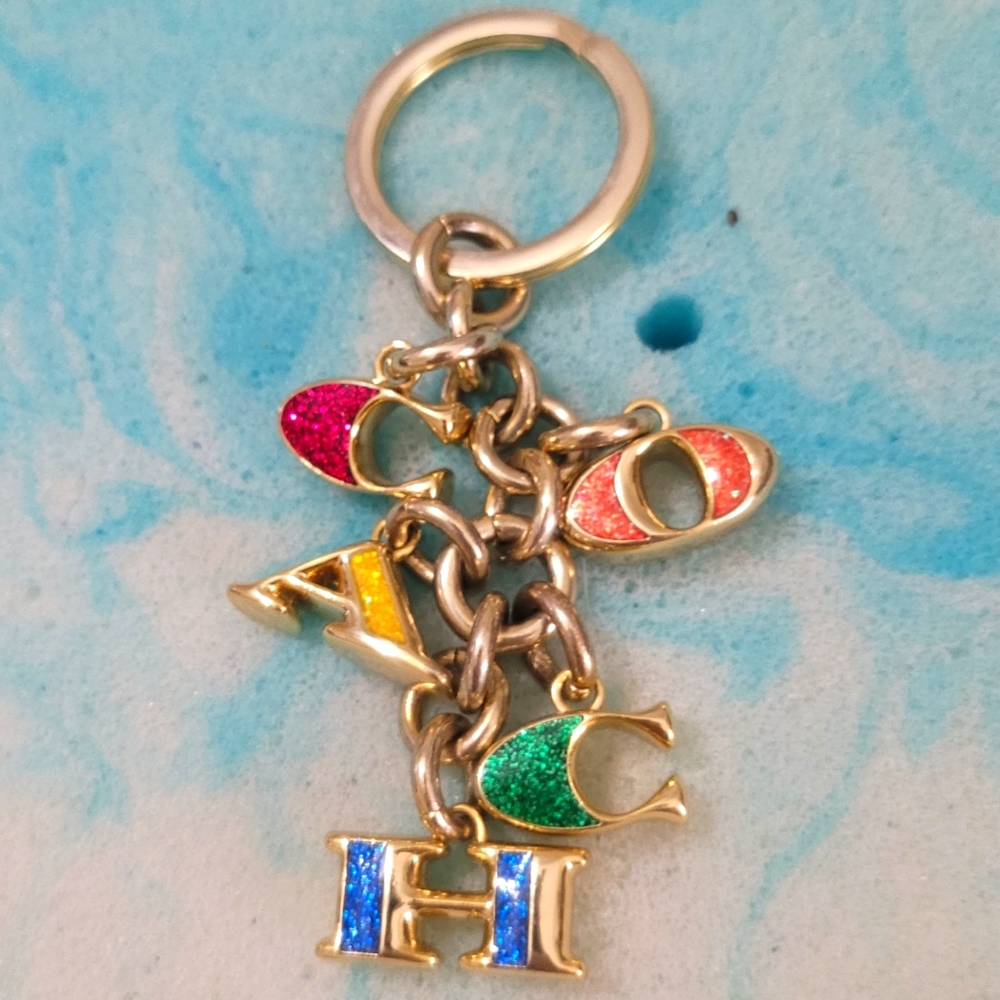 Coach decending letter rainbow edition gold keychain purse decor